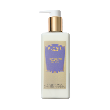 A rectangular white bottle of Floris London EU Night Scented Jasmine hand lotion with a gold pump and blue label, ideal for dry skin.