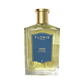 A clear glass bottle of Floris London Neroli Voyage - Eau de Parfum with a gold cap and blue label sits against a white background.