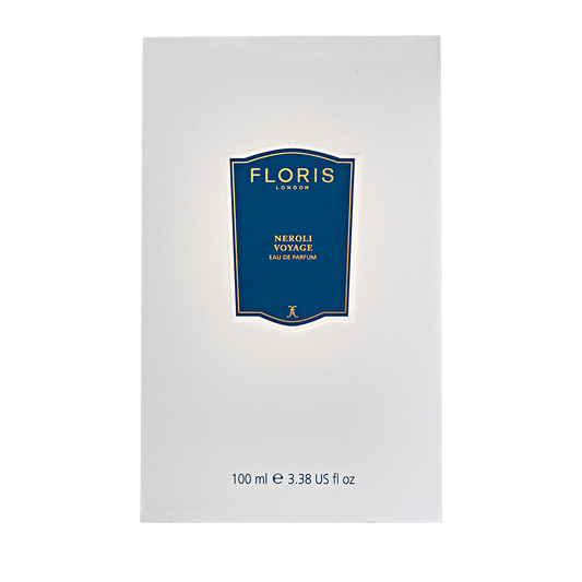 A white box with a blue label holds "Neroli Voyage - Eau de Parfum" by Floris London, 100 ml—a captivating scent of neroli and jasmine.