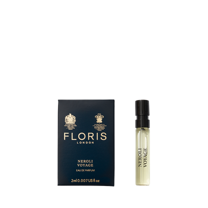 A small box labeled "Neroli Voyage - Eau de Parfum" by Floris London stands beside a 2ml spray vial of this citrus marine unisex fragrance.