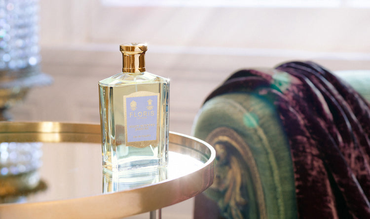 a bottle of Night Scented Jasmine placed upon a mirrored table in a sun lit room