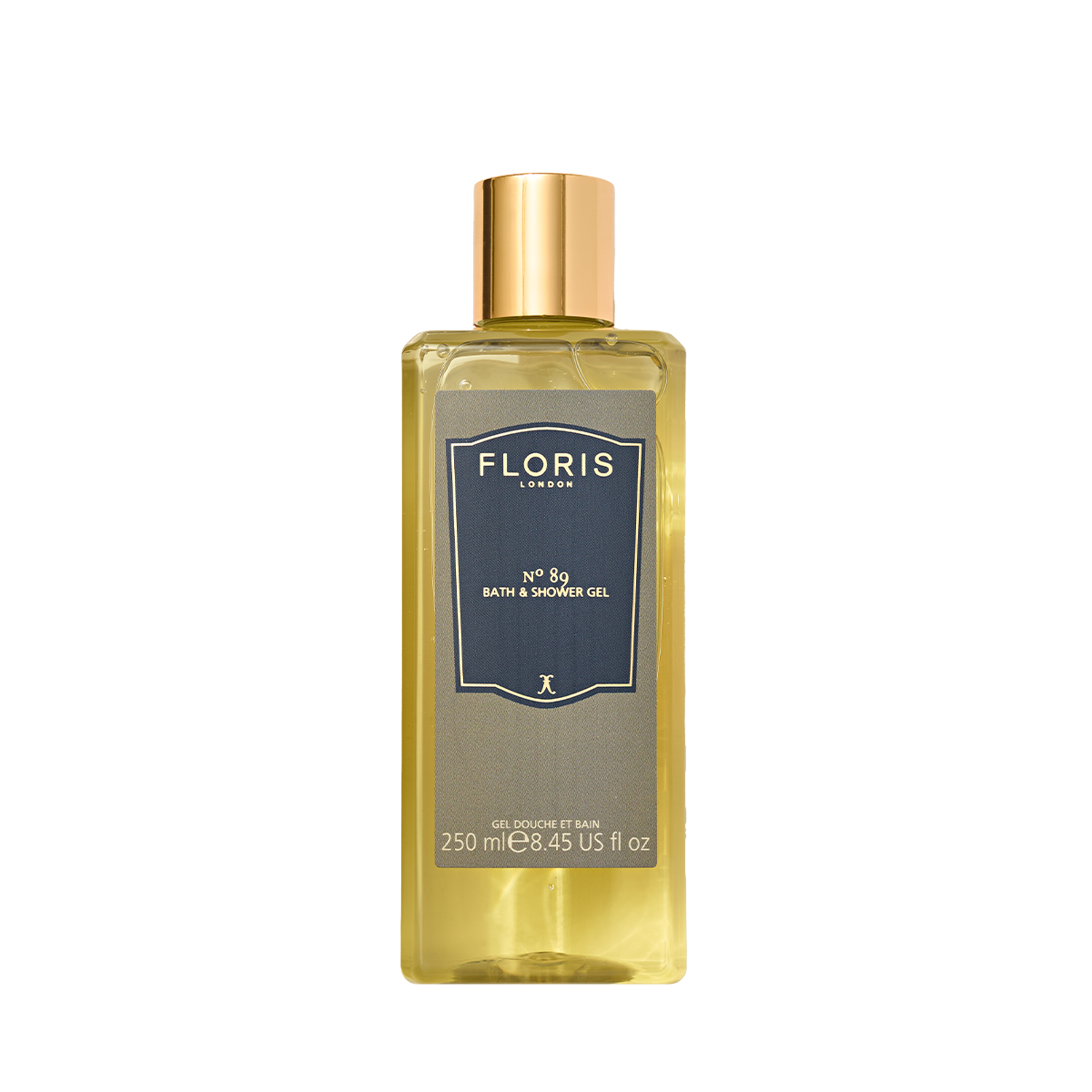 A clear plastic bottle of Floris London No. 89 Moisturising Bath & Shower Gel with a gold cap and navy label, featuring the iconic fragrance.