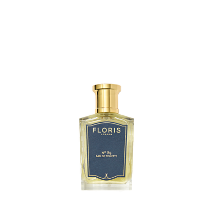 A clear glass bottle of Floris London No. 89 - Eau de Toilette, featuring a gold cap and blue label, displayed against a plain white background.
