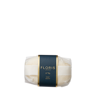 A wrapped bar of Floris London EU No. 89 Soap with a dark blue and gold label is displayed against a plain white background.