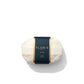 A wrapped bar of Floris London EU No. 89 Soap, with a dark label featuring the brand name and product information in gold and white text, is placed against a white background.