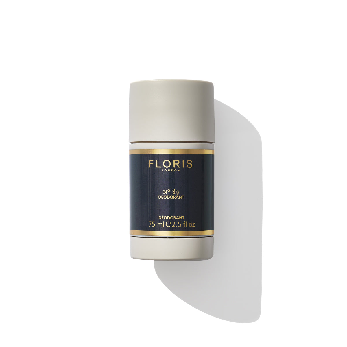 A 75 ml stick of Floris London EU No. 89 - Deodorant Stick, featuring a beige cap and a black and gold label, ideal for sensitive skin.