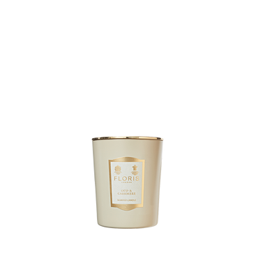 Floris London Oud & Cashmere Candle—cream-colored, gold-trimmed glass holder—adds luxe fragrance to your space. Shown on a white background.