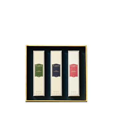 Floris London EU’s Perfumer's Trilogy: For Him—three 10ml men’s scents in a square cream box with green, blue, and red labels. A festive gift idea!.