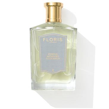 Experience English charm with Floris London's Purple Mémoire - Eau de Parfum, a sophisticated fragrance in a bottle adorned with a light blue label and gold cap.