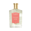 A clear bottle with a gold cap labeled "Floris London UK Red Rose Eau de Parfum," featuring elegant notes of Rose Absolute.
