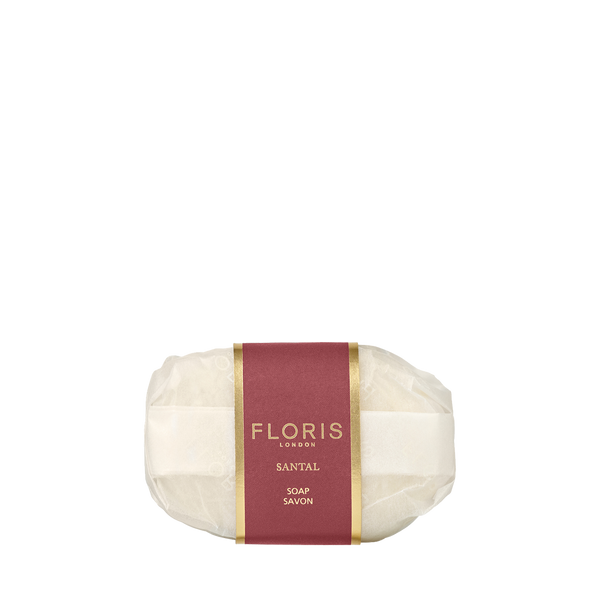 Floris London Santal - Luxury Soap: oval, vegetable-based bar wrapped in white paper, finished with a red and gold Floris Santal label.