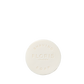 A round, white Santal Shaving Soap Refill by Floris London, enriched with shea butter, embossed "FLORIS LONDON SHAVING SOAP" on a plain white background.