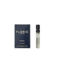 A 2 ml sample vial of Floris London Santal Eau de Toilette, a men’s sandalwood fragrance, is pictured alongside its blue box.
