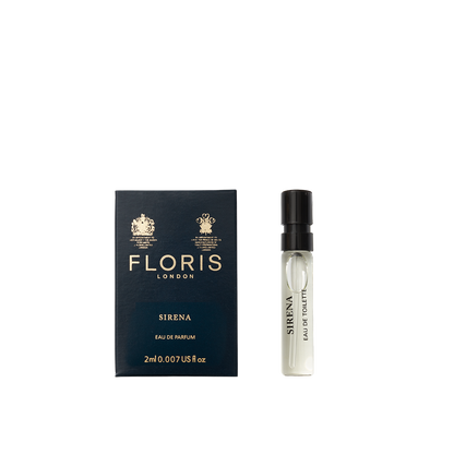 A 2ml sample vial of Floris London Sirena Eau de Parfum, a fresh floral scent with tropical notes, is displayed by its blue and gold box.