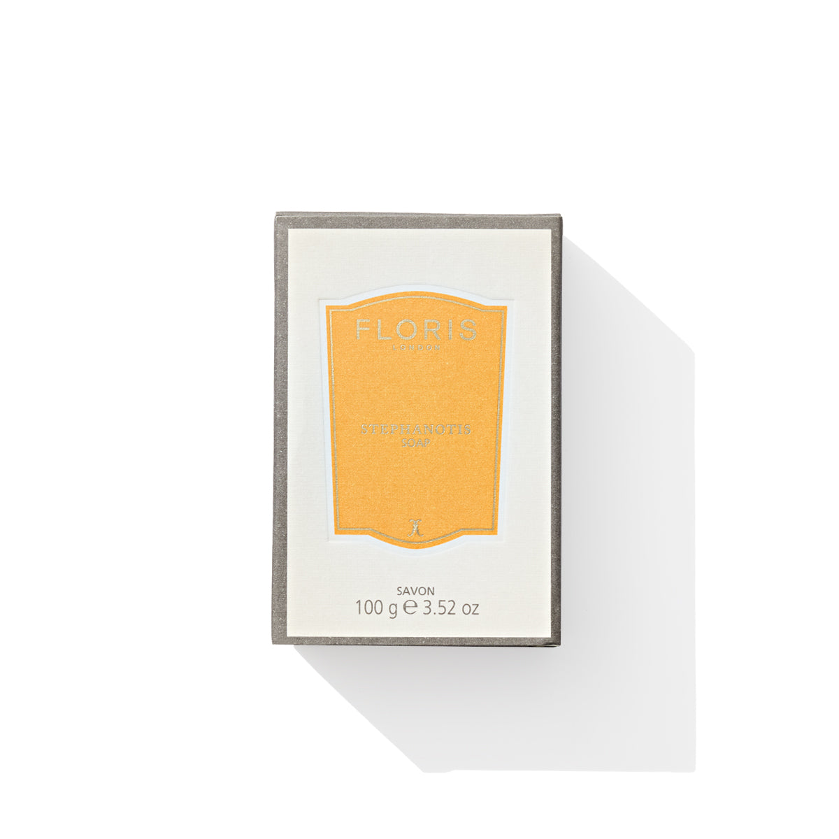 A rectangular box of Floris London EU's Stephanotis Soap, featuring a light sage green exterior and a peach-orange label. The box is labeled "Stephanotis" and contains 100g or 3.52 oz of soap.