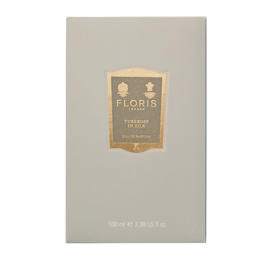 A beige box of Floris London Tuberose in Silk - Eau de Parfum, 100ml, features a gold label with product details on the front.