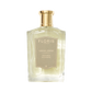 A clear glass bottle of Floris London EU Vetiver, a long-lasting vetiver fragrance with amber notes, photographed on a plain background.