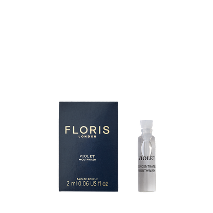 A small dark blue Floris London Violet Mouthwash box sits beside a clear 2ml vial labeled "Violet - Mouthwash.