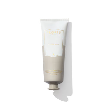 A tube of Floris London EU's White Rose - Hand Treatment Cream against a white background with a visible shadow, designed to nourish the skin and pamper very dry hands.