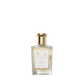 A clear glass bottle of Floris London White Rose - Eau de Toilette, a vegan scent, features a gold cap and beige label against a plain white background.
