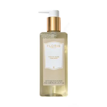 A 250ml bottle of Floris London White Rose Luxury Hand Wash with a hint of coconut and a gold pump.