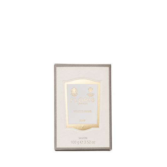 A 100g Floris London EU White Rose Soap bar, enriched with shea butter and featuring a cream and gold label on a light background.