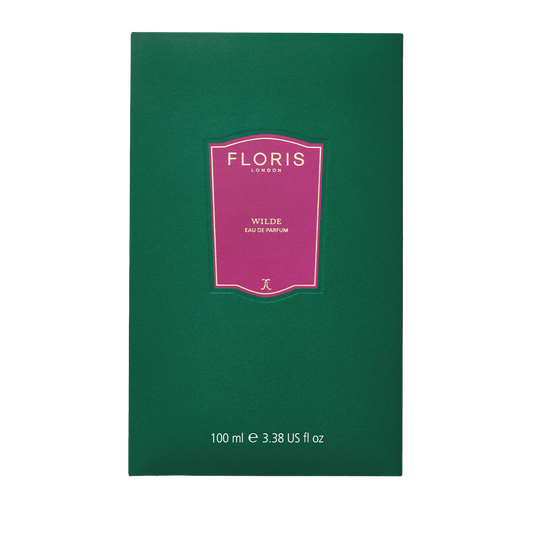 A green box of Floris London EU Wilde - Eau de Parfum with a pink label, white text, and 100 ml (3.38 US fl oz) of fragrance inside.