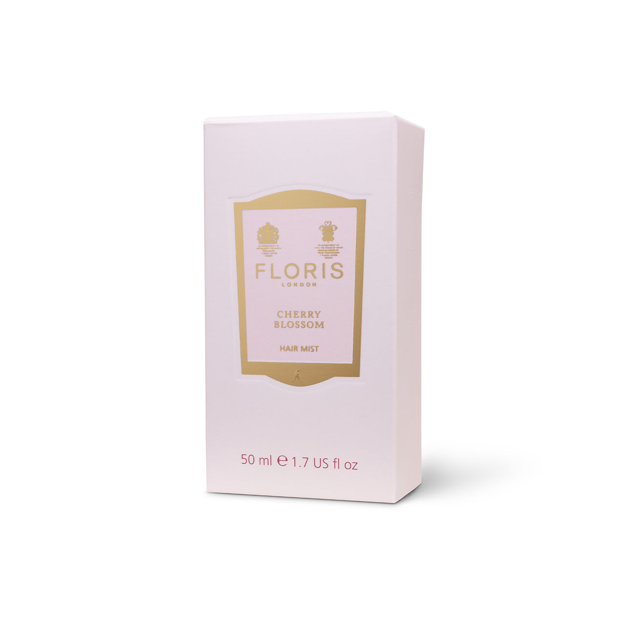 Pink and and gold packaging box for cherry blossom hair mist.
