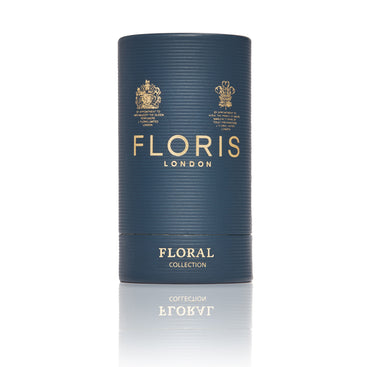 Dark blue cylinder embossed with gold lettering reading 'Floris London floral collection'.