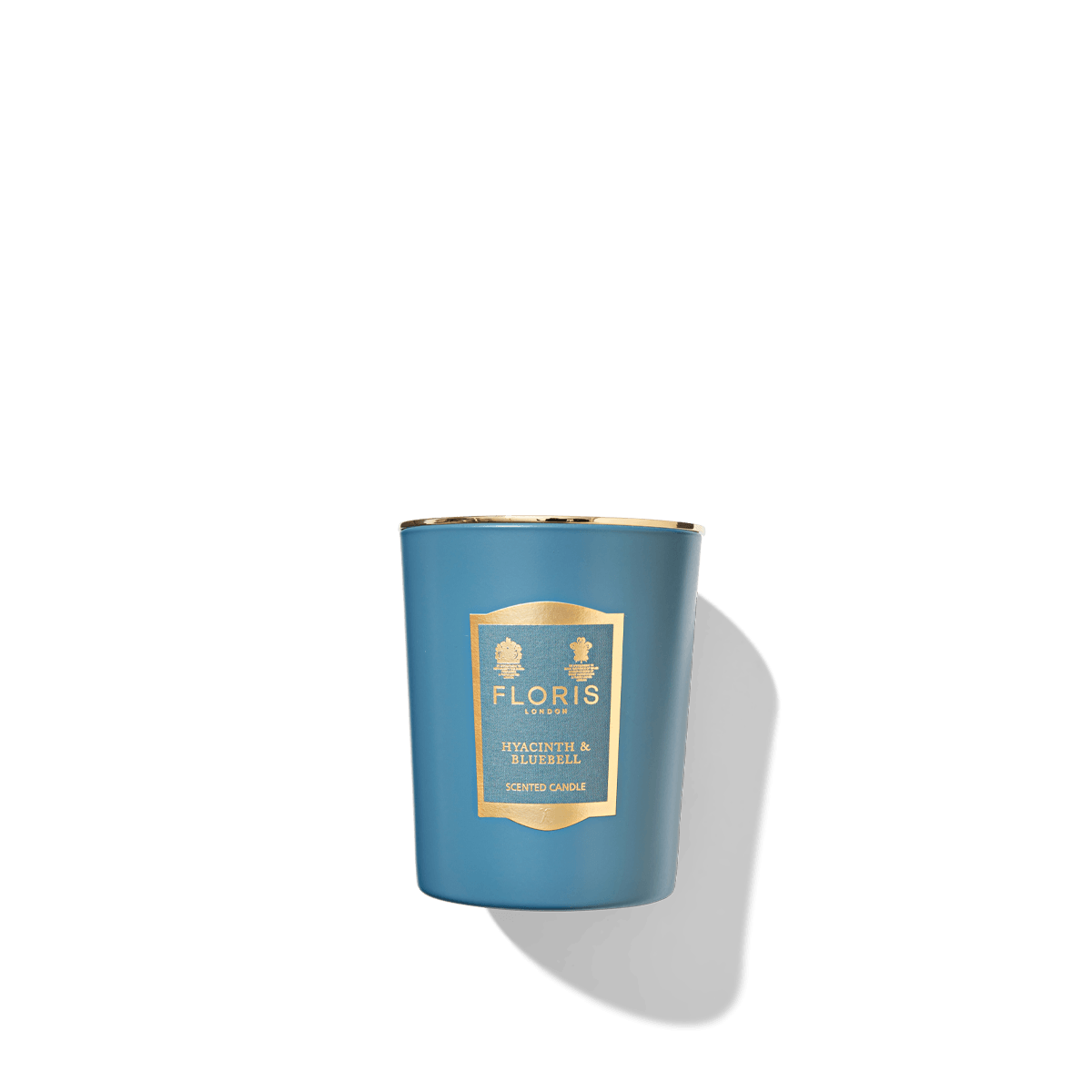 Sky blue candle with gold lid and blue label for the hyacinth and bluebell Floris london scented candle.