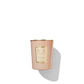 A light pink candle jar with a light pink and gold label reading 'Floris London sandalwood and patchouli scented candle'. Also included gold lid on top of candle.